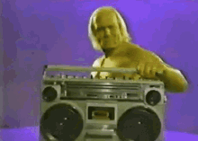 The Hulkster Says Turn It Down! GIF - Hulk Hogan Radio Smash GIFs