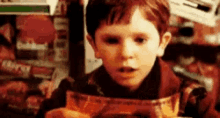 Charlie And The Chocolate Factory Golden Ticket GIF - Charlie And The Chocolate Factory Golden Ticket Willy Wonka GIFs