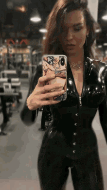 Latex Catsuit GIF - Latex Catsuit Black GIFs