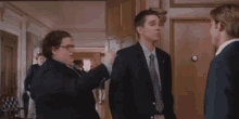 The Classic Tap On The Front With Air Handshake GIF - Accepted Introductions Jonah Hill GIFs