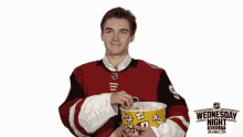 eating popcorn popcorn smiling clayton keller hockey