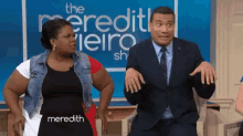 Michael Yo Becomes A T-rex On The Meredith Vieira Show And Yamaneika Saunders GIF - The Meredith Vieira Show Michael Yo T Rex GIFs