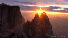 mountains cliff sun scene mountains cliff sun scene