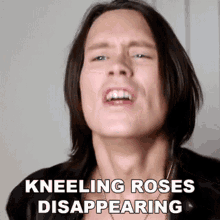 Kneeling Roses Disappearing Pellek GIF - Kneeling Roses Disappearing Pellek Per Fredrik Asly GIFs