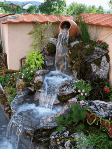 water fountain water flowing water jug water jar garden