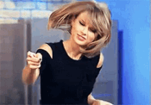 taylor swift dance happy excited