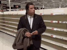 Confused John Travolta GIF - Confused John Travolta Supermarket GIFs