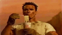 Arnold Schwarzenegger Eating Noodles GIF - Arnold Schwarzenegger Eating Noodles Dirty GIFs