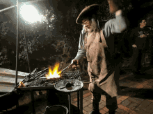 forger fire smith working old