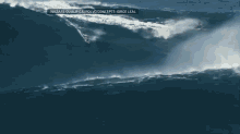 Surfer Rides World Record Wave. GIF - Surfer Wave Tall GIFs