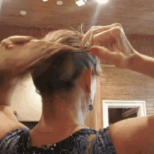 Ponytail Tie Hair GIF - Ponytail Tie Hair Fix Hair GIFs