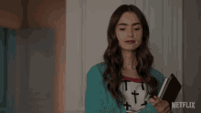 Any Tips On What To Wear Lily Collins GIF - Any Tips On What To Wear Lily Collins Emily Cooper GIFs
