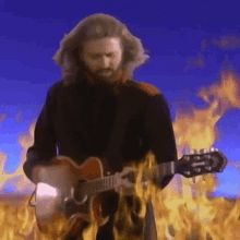 Playing Guitar Barry Gibb GIF - Playing Guitar Barry Gibb Bee Gees GIFs