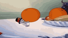 Tomand Jerry Nibbles GIF - Tomand Jerry Nibbles Orange GIFs