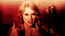 taylor swift thumbs up