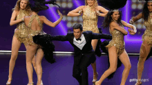 showgirls dancing adam devine emmys emmy awards