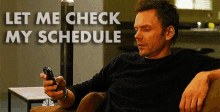 Let Me Check My Schedule GIF - Community GIFs
