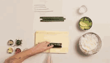 Sushi Roll In The Making GIF - Sushi Sushiroll Japanesefood GIFs