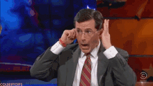 Stephen Colbert Not Listening GIF - Stephen Colbert Not Listening Not Interested GIFs