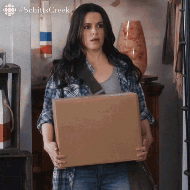 GIF of a woman saying, 'wallet full of debt'