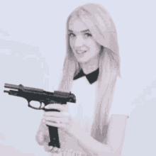 Gun Poppy GIF - Gun Poppy Load Gun GIFs