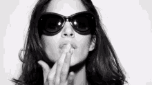 Girl Sunglasses GIF - Girl Sunglasses Lip Balm GIFs