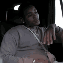 Resting Chin On Hand Kevin Gates GIF - Resting Chin On Hand Kevin Gates Cartel Swag Song GIFs