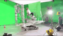 dark green screen behind the scenes machine
