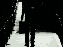 Shadow Silhouette GIF - Shadow Silhouette Briefcase GIFs
