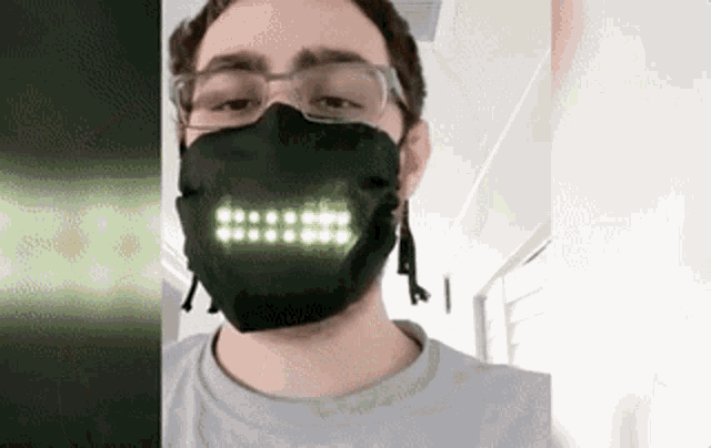 Face Mask Robot GIF - Face Mask Robot Talk - Discover & Share GIFs
