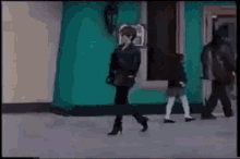 Pretty Woman In Black Walking GIF - Pretty Woman In Black Walking GIFs