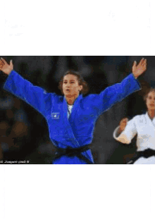 Mailinda Kelmendi Bite GIF - Mailinda Kelmendi Bite Olypic Gold Medalist GIFs
