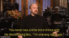 Louis Ck Starving Kid GIF - Louis Ck Starving Kid Africa GIFs