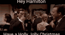 American Psycho Hey Hamilton GIF - American Psycho Hey Hamilton Hey Hamilton Have A Holly Jolly Christmas GIFs