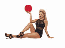 holding a ball kyle hart hit the floor pose pin up girl
