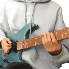playing guitar tim henson strumming feeling the music performing playing guitar tim henson strumming feeling the music performing