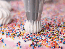 Topping Icing GIF - Topping Icing Sprinkles GIFs