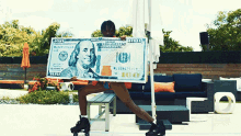 Giant100dollar Bill Plies GIF - Giant100dollar Bill Plies Im Not A Racist Song GIFs