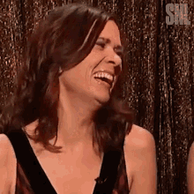 Nervous Laugh Kristen Wiig GIF - Nervous Laugh Kristen Wiig Saturday Night Live GIFs