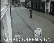Stupid Green Sign Kicking Signage GIF - Stupid Green Sign Kicking Signage Mad GIFs