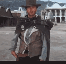 Clint Eastwood Who Are You GIF - Clint Eastwood Who Are You A Fistful Of Dollars GIFs