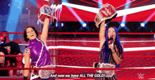 wwe and now we have all the gold champions sasha banks bayley
