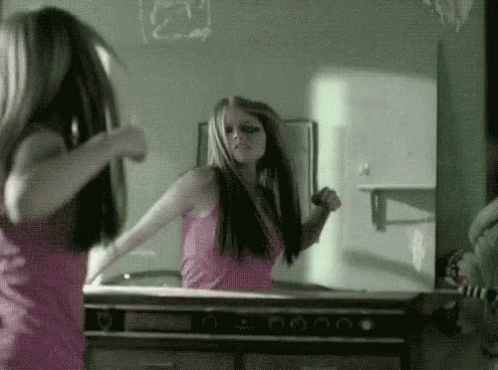 Avril Lavigne Mirror GIF - Avril Lavigne Mirror Punch - Discover &amp; Share GIFs