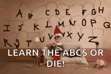 Learn The Abcs Or Die Elf On The Shelf GIF - Learn The Abcs Or Die Elf On The Shelf Xmas Jokes GIFs