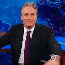Jon Stewart Shrug GIF - Jon Stewart Shrug The Daily Show GIFs