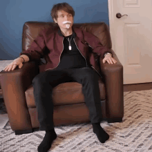Roomieofficial Sitting On The Couch GIF - Roomieofficial Sitting On The Couch Nodding Head GIFs