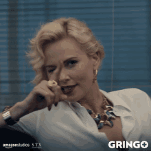 Charlize Theron GIF - Charlize Theron Winking GIFs