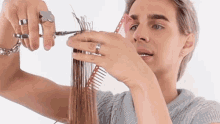 Cutting Hair Brad Mondo GIF - Cutting Hair Brad Mondo Cutting The Ends GIFs