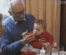 Baby Bites Grandpa'S Finger GIF - Grandparents Grandparentgifs GIFs