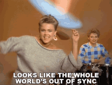 Looks Like The Whole Worlds Out Of Sync The Go Gos GIF - Looks Like The Whole Worlds Out Of Sync The Go Gos Head Over Heels GIFs